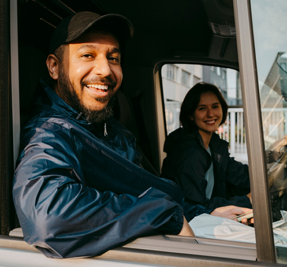 close-up of business person driving a van